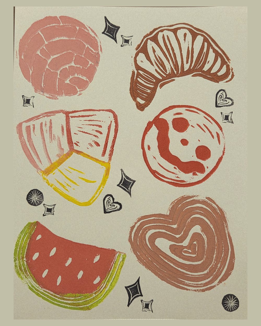 A sheet of separately carved prints: a pink concha, a brown croissant, a slice of watermelon, a cookie and a heart, scattered with small black sparkles and hearts.