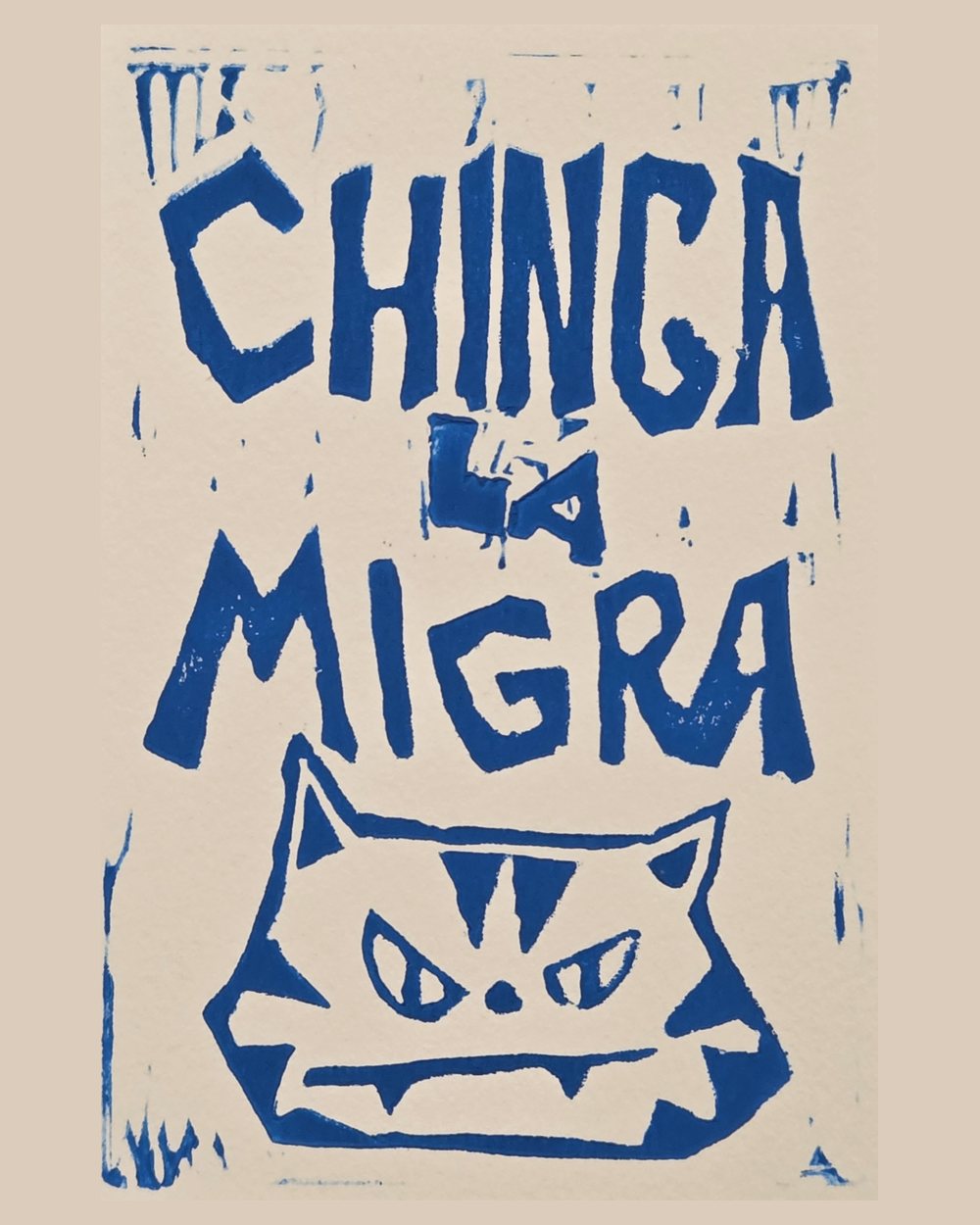 Linocut in blue: CHINGA LA MIGRA in carved capitals above a cat with bared teeth.