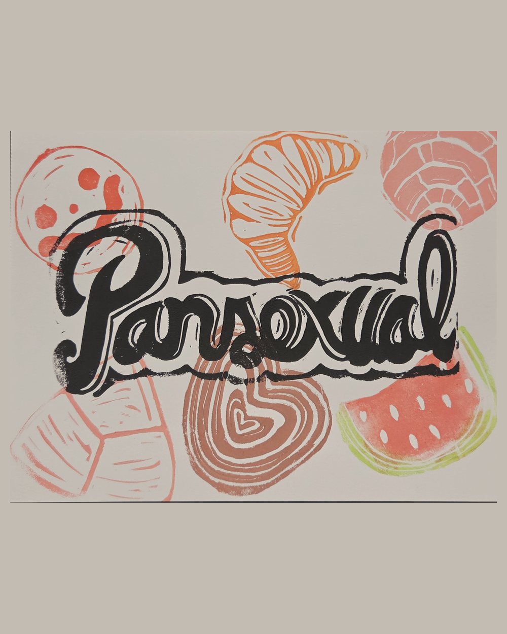 The word Pansexual in thick black brush-script, printed over a scattered background of pan dulce, a croissant, a watermelon slice and a heart in pinks, orange and green.