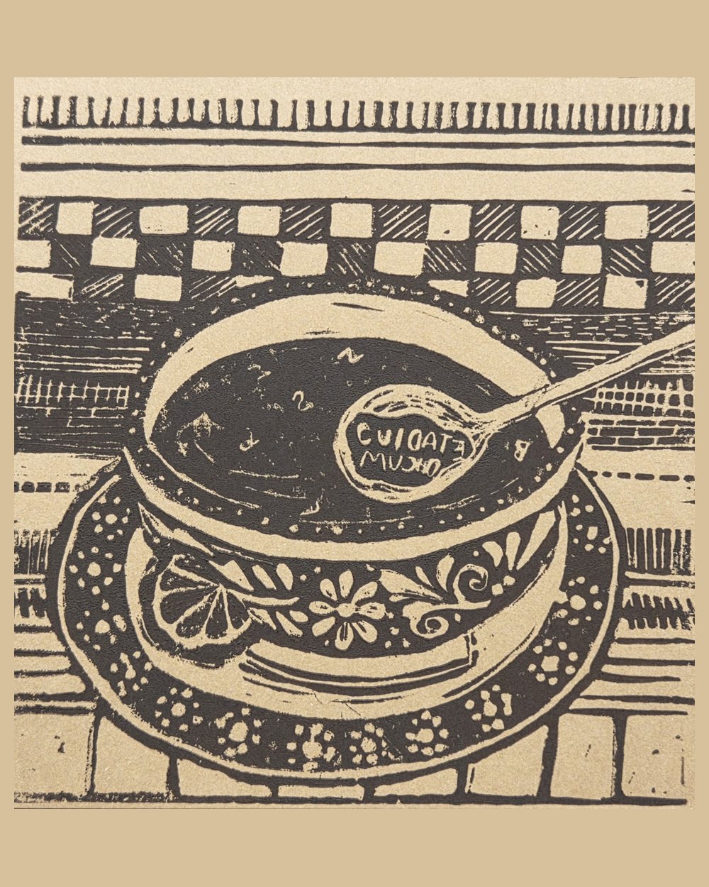 Densely carved linocut in black on kraft paper: a patterned bowl of caldo with a spoon resting in it, the spoon lettered cuídate mucho, against checkered and striped carved backgrounds.